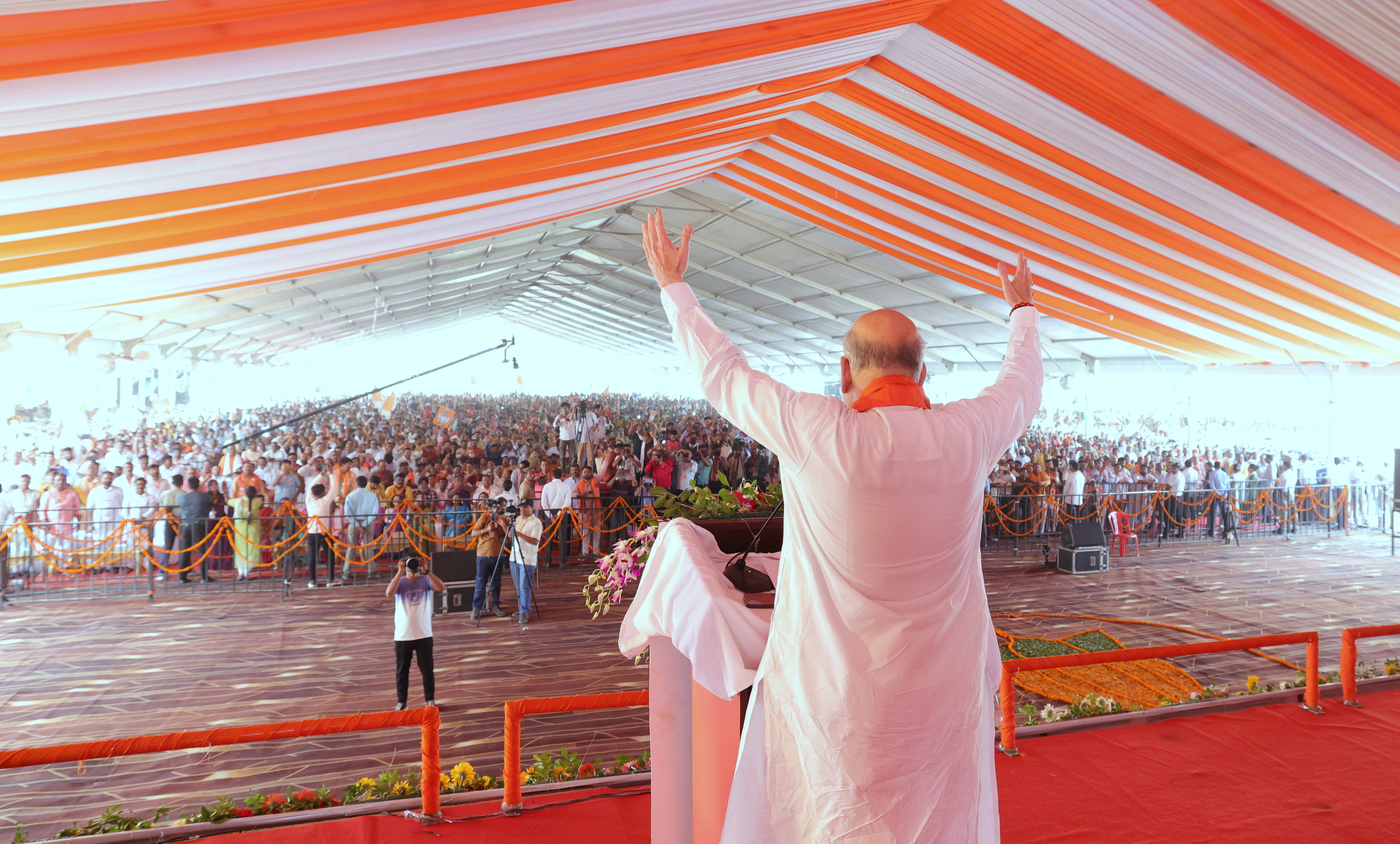 Photographs of Hon'ble Union Home Minister and Minister of Cooperation Shri Amit Shah addressing a public rally in…
